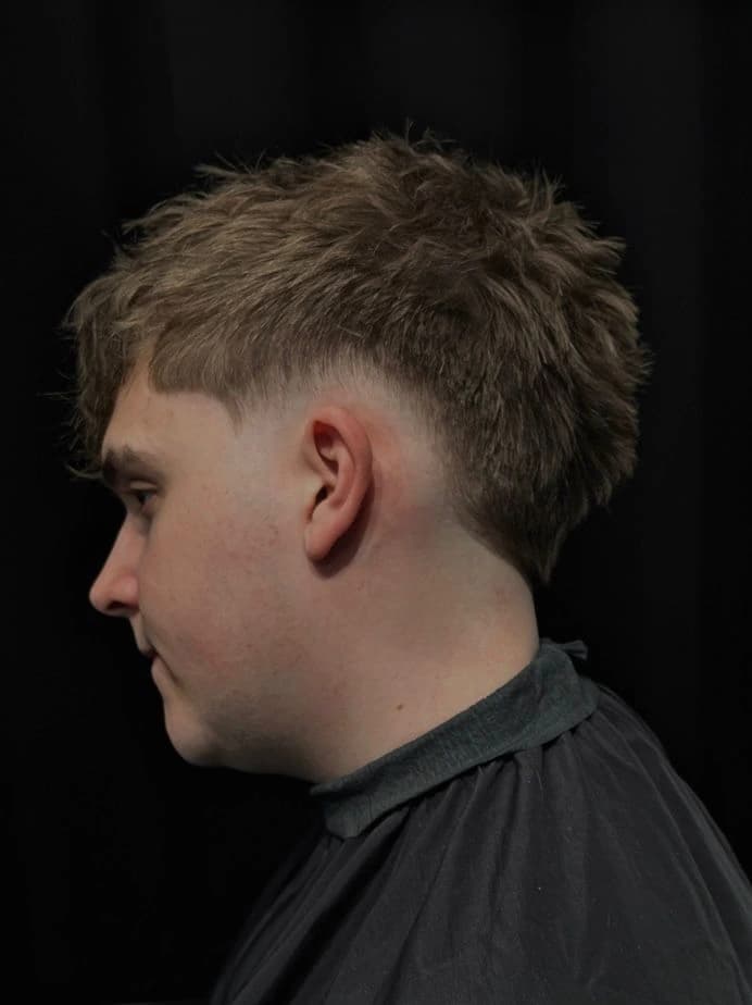 Low Fade Haarschnitt seitlich – Fade Cut Barbershop Wien 1180